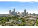 Stunning aerial view of complex with Charlotte skyline and lush green surroundings, perfect for urban living at 513 N Graham St # 1B, Charlotte, NC 28202