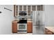 Modern kitchen features stainless steel appliances and ample cabinet space at 513 N Graham St # 1B, Charlotte, NC 28202