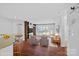 Bright living room features hardwood floors, large windows, and modern decor at 513 N Graham St # 1B, Charlotte, NC 28202