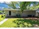 An eye-level view of the backyard with the house at 5221 Wales St, Charlotte, NC 28269