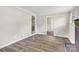 Spacious living room with new floors, and light paint throughout the home at 5221 Wales St, Charlotte, NC 28269