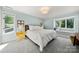 Bright bedroom with natural light, featuring neutral colors and a cozy window seat for relaxation at 54 Honeysuckle Woods, Clover, SC 29710