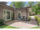 Charming patio with a bench and manicured landscaping offers a relaxing outdoor space at 54 Honeysuckle Woods, Clover, SC 29710