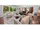 Open concept living area with sliding glass door, sliding barn door, and modern furniture at 54 Honeysuckle Woods, Clover, SC 29710