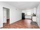 Open-concept living space showcasing neutral decor, gleaming floors, and seamless flow to the kitchen at 6517 Paleface Pl, Charlotte, NC 28214