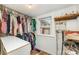 Walk in closet provides ample space for your entire wardrobe, keeping your belonging organized and easily accessible at 702 S Government St, Lincolnton, NC 28092