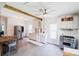 Spacious eat-in kitchen features stainless steel appliances and an open floor plan with ample natural light at 702 S Government St, Lincolnton, NC 28092