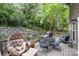 Backyard wooden deck features comfortable seating and lush landscaping at 812 Thornapple Ct, Lake Wylie, SC 29710