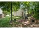 Large grassy backyard features ambient outdoor lighting and seating at 812 Thornapple Ct, Lake Wylie, SC 29710