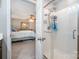 Modern bathroom with a tile shower and an entrance to the main bedroom at 812 Thornapple Ct, Lake Wylie, SC 29710