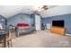 Cozy bedroom features a unique metal scroll bed frame and neutral carpet at 812 Thornapple Ct, Lake Wylie, SC 29710