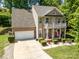 Lovely home with a well-kept lawn and landscaping, an attached garage, and a charming front porch at 812 Thornapple Ct, Lake Wylie, SC 29710