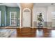 Entryway with hardwood floors, high ceilings, and bright windows, offering a welcoming ambiance at 812 Thornapple Ct, Lake Wylie, SC 29710