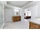 Modern bathroom with double vanity and a view of the bedroom suite at 905 Patricians Ln, Monroe, NC 28110