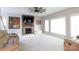 Spacious living room features a stone fireplace, large TV, and neutral decor at 905 Patricians Ln, Monroe, NC 28110