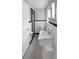Bright bathroom featuring a white sink, toilet, shower, and classic black and white tile at 104 Tobe Bridge Rd, Kings Mountain, NC 28086