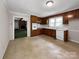 Classic kitchen with wood cabinets and a view to a living area at 104 Tobe Bridge Rd, Kings Mountain, NC 28086