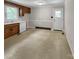 Functional kitchen features wood cabinets, a double bowl sink, and bright lighting at 104 Tobe Bridge Rd, Kings Mountain, NC 28086