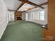 Inviting living room featuring a cozy brick fireplace, ceiling fan, and well-lit windows at 104 Tobe Bridge Rd, Kings Mountain, NC 28086