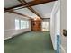 Living room with wooden beams, built-in cabinets, and lots of natural light at 104 Tobe Bridge Rd, Kings Mountain, NC 28086