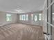 Bright living room with large windows and a decorative front door at 104 Tobe Bridge Rd, Kings Mountain, NC 28086