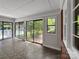 Bright sunroom with sliding glass doors opening to the outdoor patio at 104 Tobe Bridge Rd, Kings Mountain, NC 28086