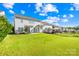 Backyard with a lush green lawn, fence, and patio area, perfect for outdoor enjoyment at 10693 Sky Chase Nw Ave, Concord, NC 28027