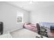 Comfortable bedroom with natural light, carpeted floor and a cozy atmosphere, ideal for rest and relaxation at 10693 Sky Chase Nw Ave, Concord, NC 28027