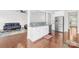 Open concept floorplan with seamless transition from living room to kitchen with stainless steel appliances at 10693 Sky Chase Nw Ave, Concord, NC 28027