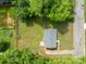Birds eye view of a charming one-story home with mature trees and a fenced backyard at 109 Jackson St, Salisbury, NC 28144