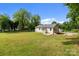 Spacious backyard with lush green grass and fenced yard for outdoor activities at 109 Jackson St, Salisbury, NC 28144