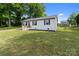 Attractive home exterior with manicured lawn, providing a welcoming curb appeal at 109 Jackson St, Salisbury, NC 28144