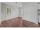 Bright living room with wood look floors, large closet, and plenty of natural light at 109 Jackson St, Salisbury, NC 28144