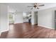 Open-concept living area with sleek floors connecting living room and kitchen at 109 Jackson St, Salisbury, NC 28144