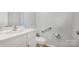 Modern half-bathroom featuring a white vanity, updated sink faucet, and essential toiletries at 10901 Claude Freeman Dr, Charlotte, NC 28262