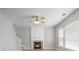 Bright living room area highlights the stunning fireplace and large windows at 10901 Claude Freeman Dr, Charlotte, NC 28262