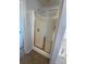 Bright bathroom featuring a glass shower enclosure and tile floors at 10901 Claude Freeman Dr, Charlotte, NC 28262