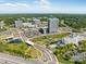 Scenic aerial view of commercial buildings, roadways, trees, and landscape design at 1099 Sugar Creek Rd, Indian Land, SC 29707