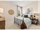 Bright bedroom with neutral tones, decorative wall art and a wrought iron bed frame at 1099 Sugar Creek Rd, Indian Land, SC 29707