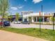 Street view of retail shops with Flower , a pedestrian walkway, and parking in front at 1099 Sugar Creek Rd, Indian Land, SC 29707