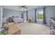Spacious bedroom with ample natural light from large windows and a ceiling fan at 1108 Longwood Ct, Matthews, NC 28104