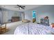 Bedroom with cool toned walls, carpet, and a doorway to the bathroom at 1108 Longwood Ct, Matthews, NC 28104