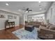Spacious living area with hardwood floors, neutral furniture, and ample natural light at 1108 Longwood Ct, Matthews, NC 28104