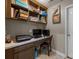 Bright office area with desk space, built-in shelving, and neutral paint at 1108 Longwood Ct, Matthews, NC 28104