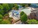 A captivating aerial view showcasing the community waterpark, complete with slides and pools at 1108 Longwood Ct, Matthews, NC 28104
