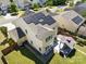 Aerial view of backyard showing gazebo, patio, lawn, fence, and solar panels, offering privacy and sustainability at 1125 Jasmine Dr, Fort Mill, SC 29707