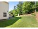 Spacious backyard featuring a gazebo, lush green lawn, and privacy fence, great for outdoor activities at 1125 Jasmine Dr, Fort Mill, SC 29707