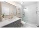 Modern bathroom features a walk-in shower with glass doors, and a stylish vanity at 1125 Jasmine Dr, Fort Mill, SC 29707