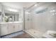 Modern main bathroom featuring a glass-enclosed shower with a built-in seat and neutral tiling at 113 Callandor Ct, Troutman, NC 28166