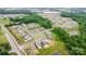 Scenic aerial view of a neighborhood with tree-lined streets, meticulously planned layouts, and inviting curb appeal at 1313 Forkhorn Dr, Monroe, NC 28110